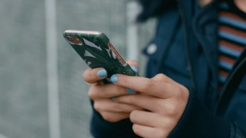 Close up hands woman using smartphone texting sending social media messages 스톡 동영상 99790349