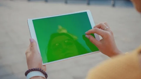 Close up hands woman using touch tablet device computer with green screen Stock Footage 116440687