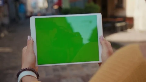 Close up hands woman using touch tablet device computer with green screen Stock Footage 116441787