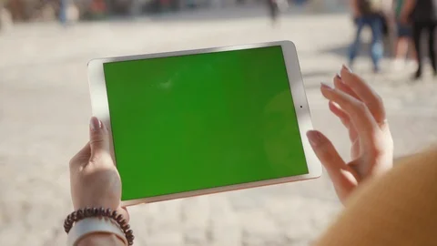 Close up hands woman using touch tablet device computer with green screen Stock Footage 116442950