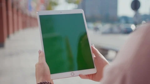 Close up hands woman using touch tablet device computer with green screen Stock Footage 116457873