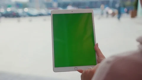 Close up hands woman using touch tablet device computer with green screen Stock Footage 116461472