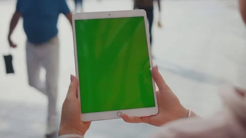 Close up hands woman using touch tablet device computer with green screen Stock Footage 116461680