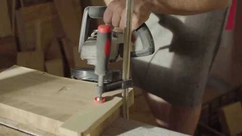 Close up hands of woodworker carpenter using brashing scribing machine Stock Footage 76092588