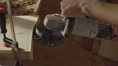 Close up hands of woodworker carpenter using brashing scribing machine Stock Footage 76092940