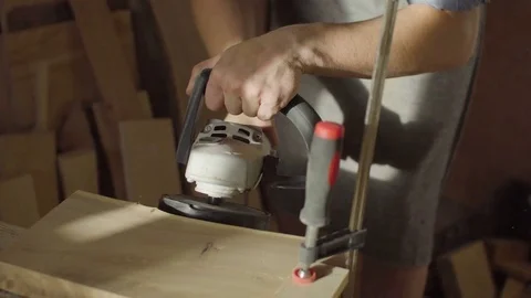 Close up hands of woodworker carpenter using brashing scribing machine Stock Footage 76095646