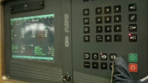 Close-up hands of worker examining buttons on control panel of a machine. Stock Footage 169491360