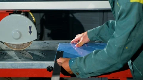 Close-up hands of worker make measure with help ruler blue ceramic tile Video stock 90917749