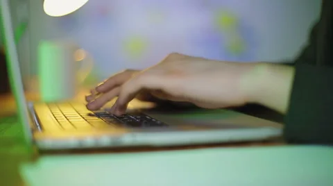 Close-up of hands of the worker of office who prints documents on the laptop. Stock Footage 62521256