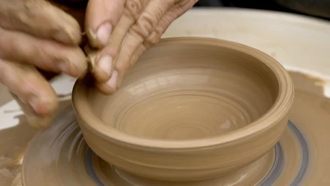 Close up of hands working clay on potter. Stock Footage 91067631