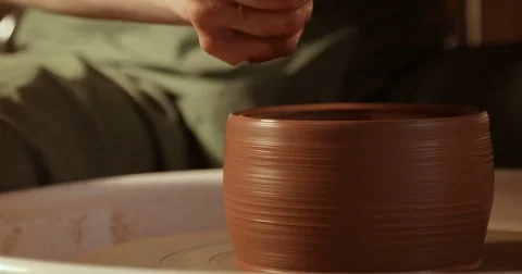 Close up of hands working clay on potter's wheel, close-up view Stock-Footage 74734798