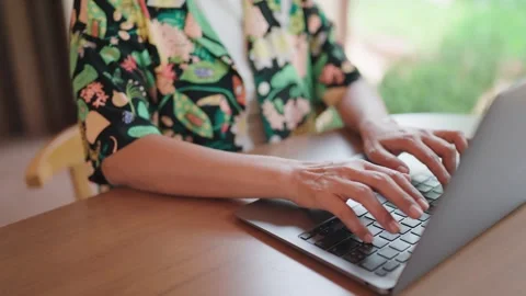Close-up of hands working on laptop using hands typing on keyboard.	 Video stock 273134675