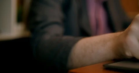 Close up of hands of a young designer using a tablet and a laptop computer 4k Stock Footage 87324402