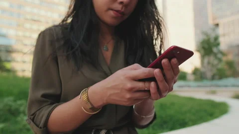 Close-up of the hands of young girl using mobile phone Stock Footage 227105055