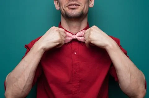 Close-up of the hands of a young man in red shirt Stock Photos