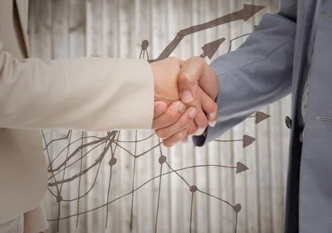 Close up of handshake against brown graph and blurry wood panel Stock Photos
