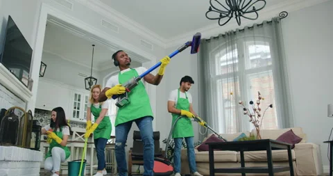 Close up of handsome in good mood cheerful black-skinned worker of cleaning Stock Footage 145015884