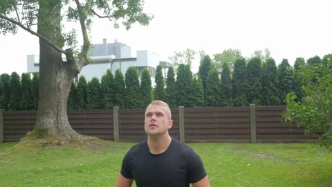 Close up of handsome man doing pull-ups exercises. Video stock 84003190