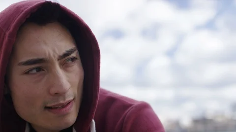 Close up of handsome man getting his breath back after a workout, in slow motion Video stock 85596040