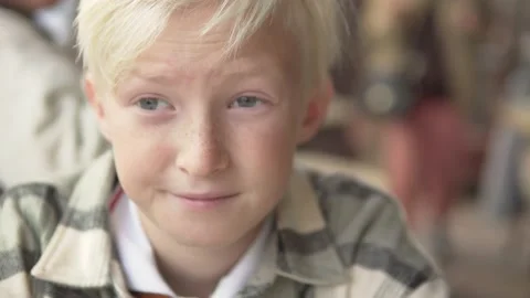 Close-up, handsome schoolboy boy with white hair Stock Footage 224716088