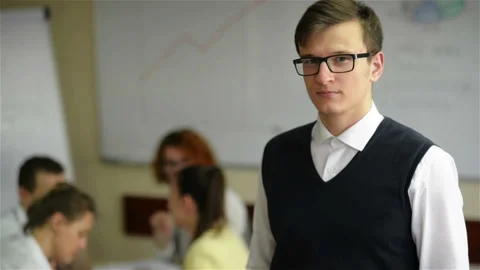 Close up of handsome young worker wearing eyeglasses and flannel shirt in small  Stock Footage 110818267