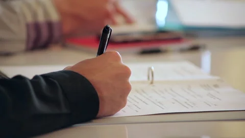 Close-Up of Handwriting on Paper During School Lesson Stock-Footage 333706543