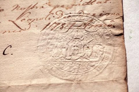 A close-up of a handwritten document, likely from the 18th century, granting Stock Photos