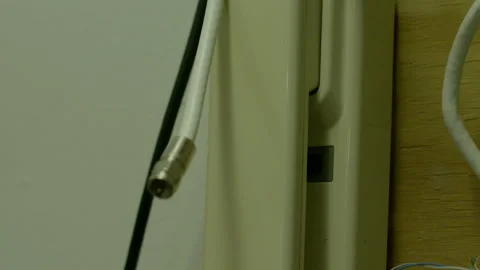 Close-Up of Hanging Coaxial Cable Connector Stock Footage 344608853