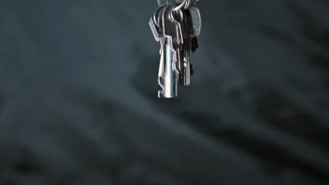 Close Up of Hanging House Keys on Keychain with Blurred Background Stock Footage 337785069