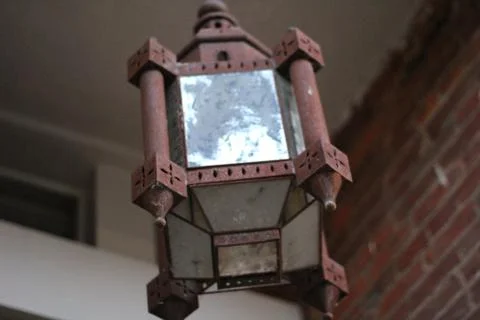 Close Up of Hanging Rustic Rusted Lamp Stock Photos