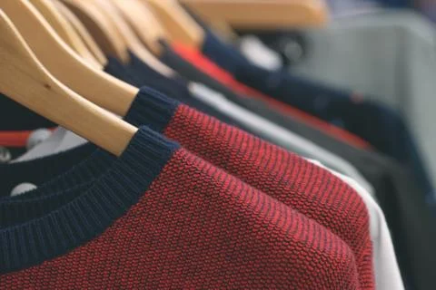 Close-up of hanging wool clothes at the store Stock Photos
