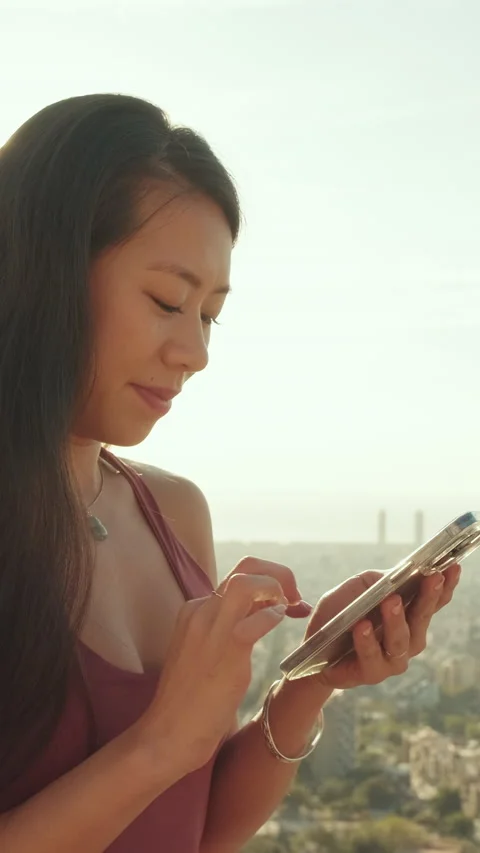 Close up, happy athletic woman using mobile phone while standing at lookout Stock Footage 229505252