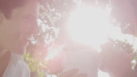 Close Up Happy Baby Held Young Parents Sun Flare Stock Footage 273579464