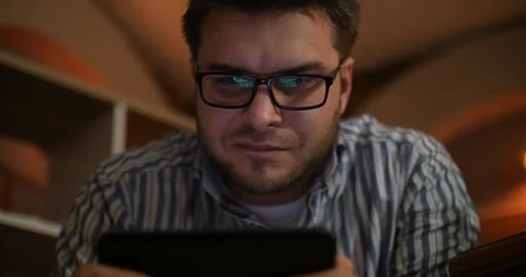 Close up of happy bearded man using smartphone Stock Footage 87324178