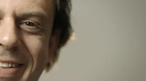 Close-up of happy caucasian adult man smiling at camera Stock Footage