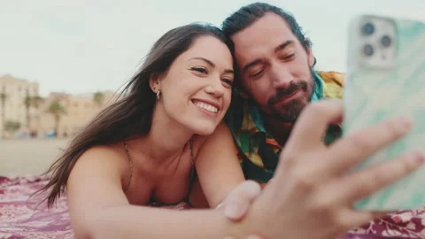 Close up, happy couple taking selfie video on mobile phone Stock Footage 227143945