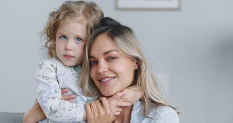 Close up of happy cute affectionate adopted little kid girl hugging foster care Vídeo Stock 132319558