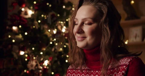 Close up of happy girl sits in beautiful cozy decorated country house near Stock Footage 166322764