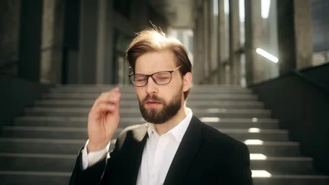 Close up of happy handsome bearded man in formal suit looking to camera and Stock Footage 251807507