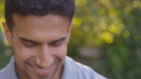 Close up happy man dancing looking at camera. - Slow Motion - shot on RED Stock Footage 125163792