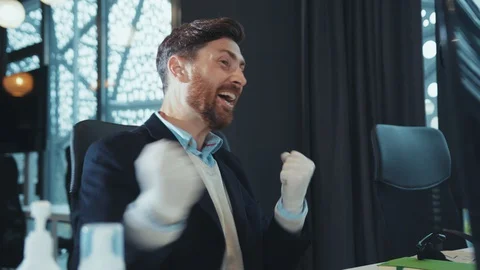 Close up happy man in gloves work use computer feel shock wonder happy look at Video stock 130002050