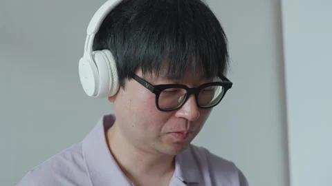 Close up of happy middle-aged man, listening to music 1 Stock Footage 260291427