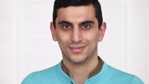 Close-up of a happy middle eastern man smiling Stock Footage 86383318