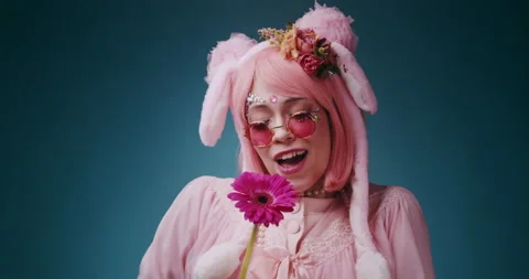 Close up of happy pink cute candy anime girl with rabbit ears and pink Stock-Footage 156927342