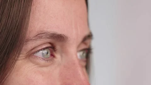 Close-up of a happy womans eye looking with clarity and confidence Stock Footage 319136809