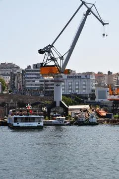 Close-up of a harbor crane for unloading. Stock Photos