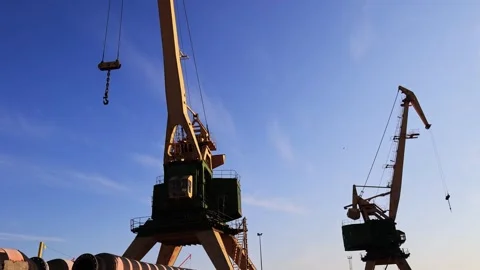 Close-up of harbour cranes standing on the harbor quay. Stock Footage 244848809