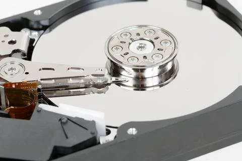 Close up of hard disk with abstract reflection Opened hard disk drive. Int... Stock Photos