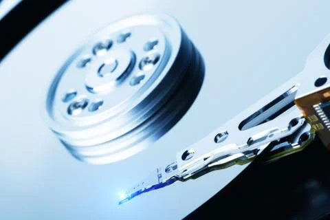Close up of hard disk with clean surface and working laser head Stock Photos