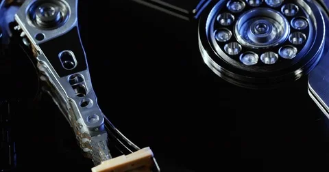 Close Up Hard Disk Drive, blue in reflection. HDD. Technology, computer systems Stock Footage 78799413